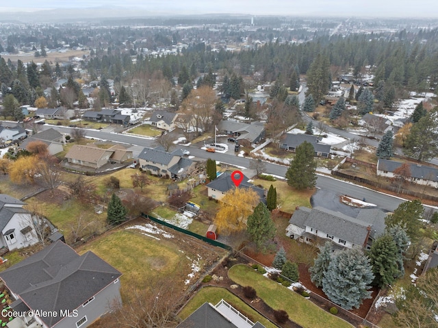 birds eye view of property with a residential view