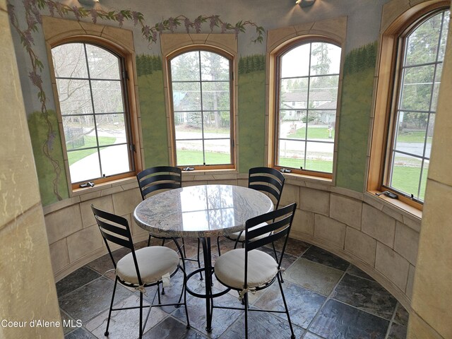 11268 N Friar Dr, Hayden, ID 83835 - dining room with stone tile floors