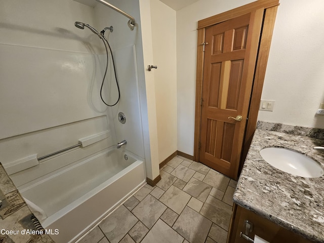 11268 N Friar Dr, Hayden, ID 83835 - bathroom featuring vanity, baseboards, and shower / washtub combination
