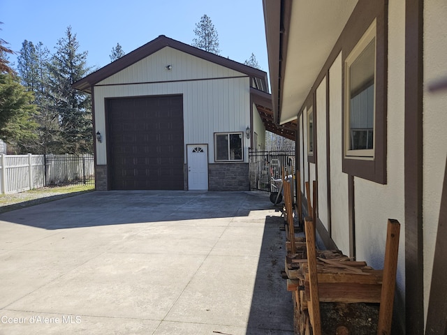 11268 N Friar Dr, Hayden, ID 83835 - garage featuring fence and concrete driveway