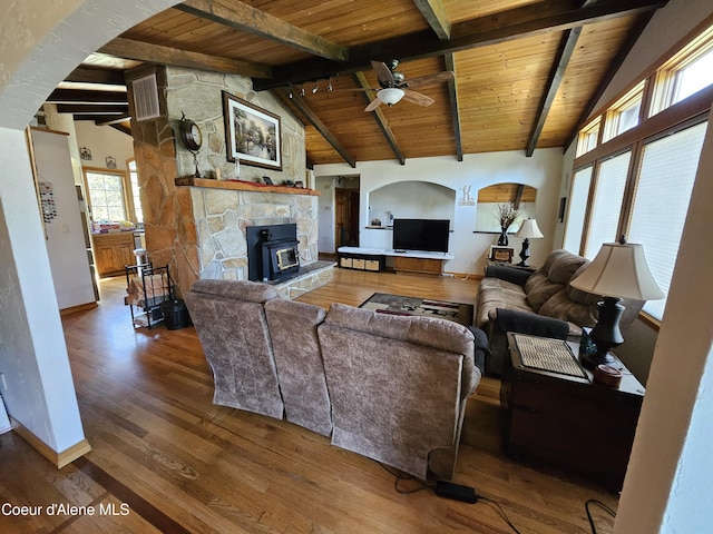 11268 N Friar Dr, Hayden, ID 83835 - living room featuring a healthy amount of sunlight, vaulted ceiling with beams, wood ceiling, and a ceiling fan