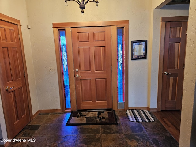 11268 N Friar Dr, Hayden, ID 83835 - entrance foyer featuring a textured wall and baseboards