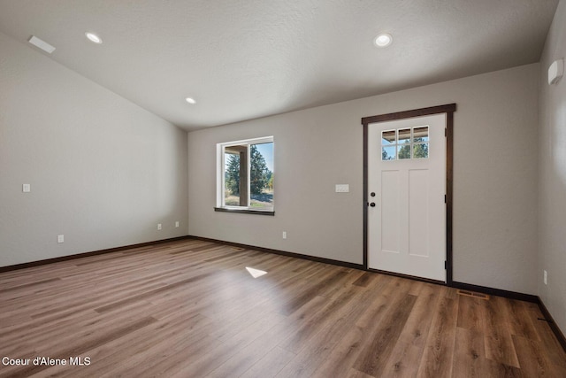 818 Sawbuck Rd, Spirit Lake, ID 83869 - foyer with light wood-type flooring, baseboards, and recessed lighting