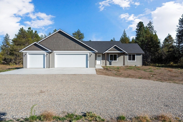 818 Sawbuck Rd, Spirit Lake, ID 83869 - ranch-style home featuring an attached garage and driveway