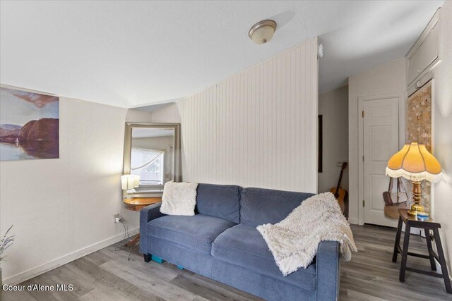 1515 E Elm Ave, Coeur Dalene, ID 83814 - living area featuring wood finished floors and baseboards