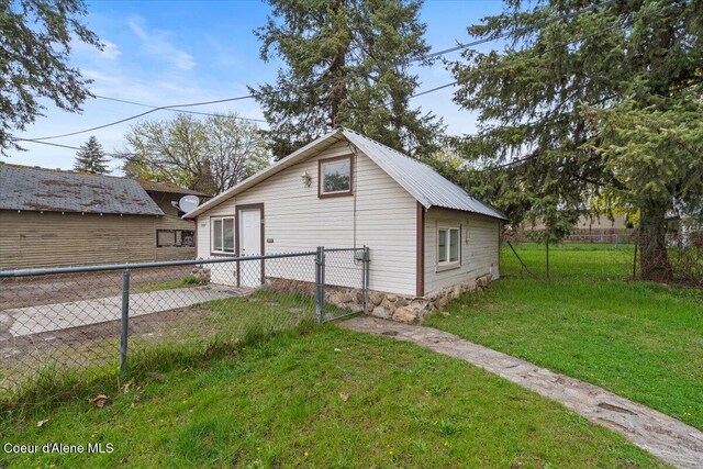 1515 E Elm Ave, Coeur Dalene, ID 83814 - view of side of property with metal roof