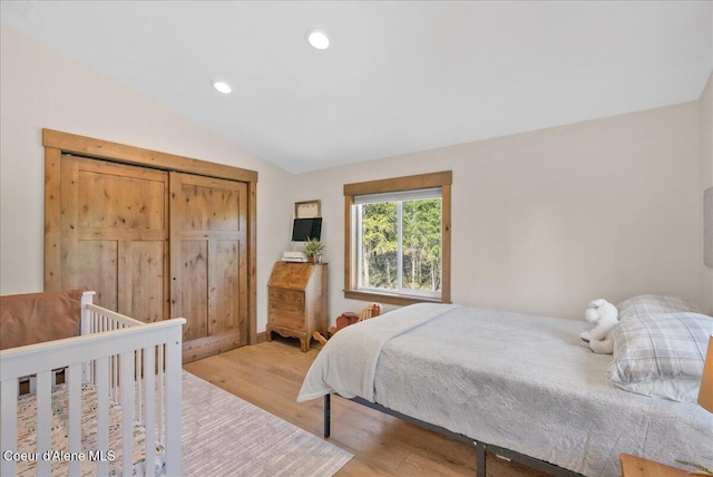 329 N Healing Dr, Blanchard, ID 83804 - bedroom featuring recessed lighting, vaulted ceiling, and light wood-type flooring