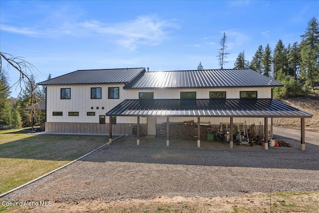 329 N Healing Dr, Blanchard, ID 83804 - view of front facade with board and batten siding, a standing seam roof, and metal roof