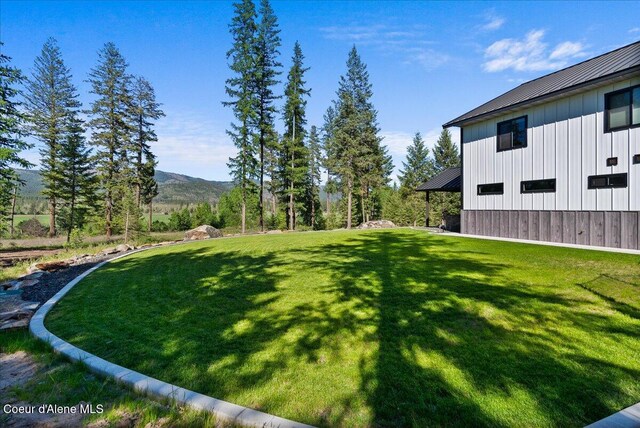 329 N Healing Dr, Blanchard, ID 83804 - view of green lawn with a mountain view