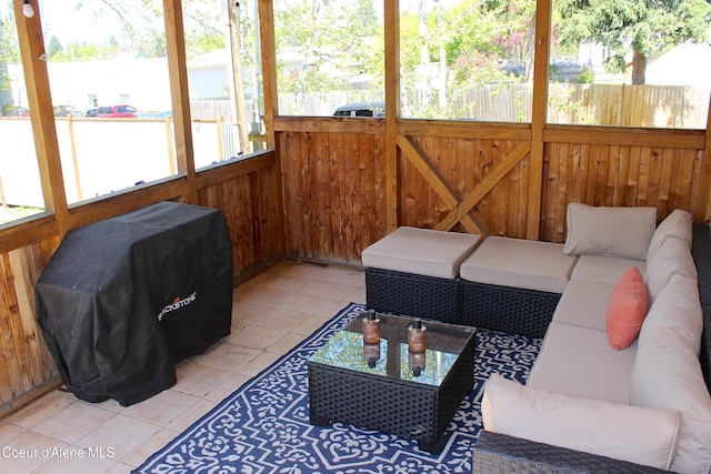 sunroom with an outdoor hangout area
