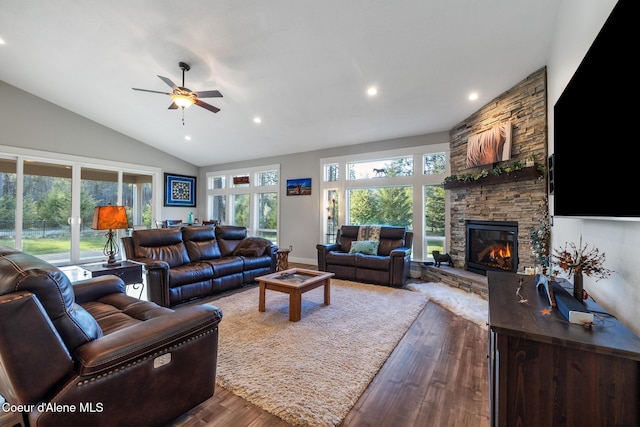 5867 W Sparrowhawk Dr, Rathdrum, ID 83858 - living area featuring a ceiling fan, a stone fireplace, lofted ceiling, dark wood-style flooring, and recessed lighting