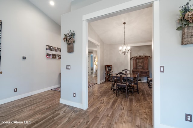 5867 W Sparrowhawk Dr, Rathdrum, ID 83858 - dining room featuring baseboards, recessed lighting, a chandelier, lofted ceiling, and wood finished floors