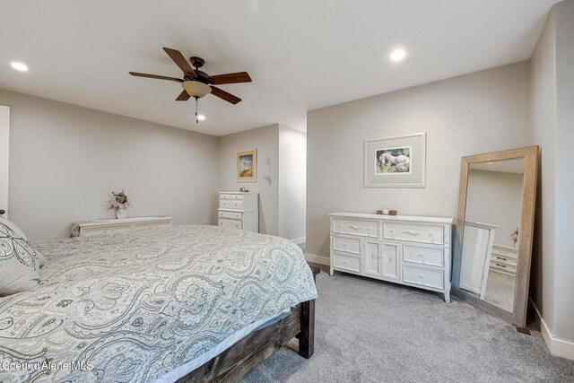 5867 W Sparrowhawk Dr, Rathdrum, ID 83858 - bedroom with light colored carpet, ceiling fan, baseboards, and recessed lighting