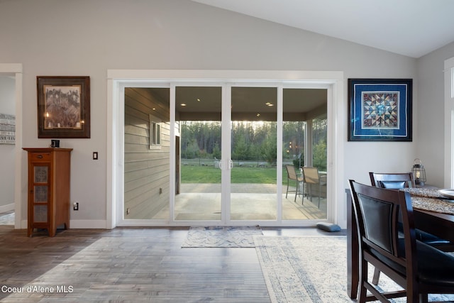 5867 W Sparrowhawk Dr, Rathdrum, ID 83858 - entryway with lofted ceiling, baseboards, and wood finished floors
