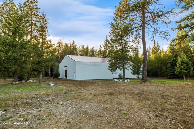 5867 W Sparrowhawk Dr, Rathdrum, ID 83858 - exterior space with an outbuilding and a pole building
