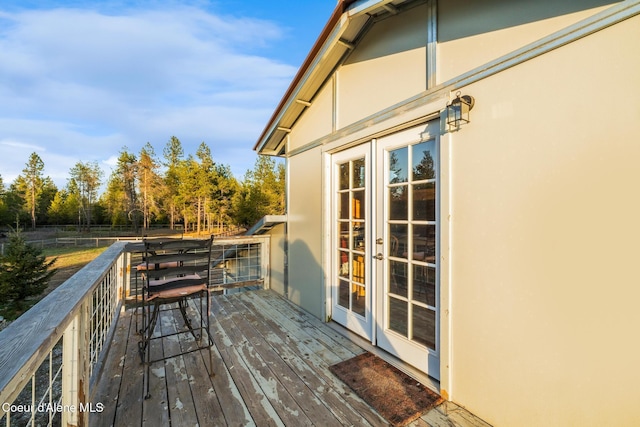 5867 W Sparrowhawk Dr, Rathdrum, ID 83858 - wooden deck with french doors