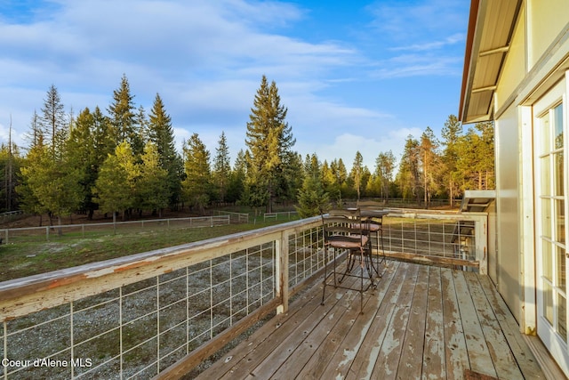 5867 W Sparrowhawk Dr, Rathdrum, ID 83858 - wooden terrace featuring fence