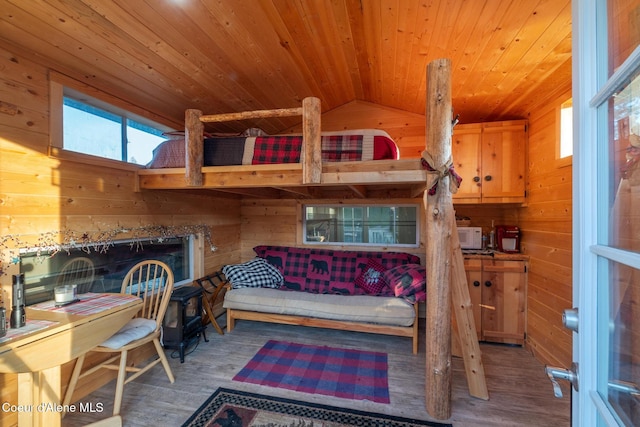 5867 W Sparrowhawk Dr, Rathdrum, ID 83858 - bedroom featuring wooden ceiling, vaulted ceiling, wood finished floors, and wooden walls