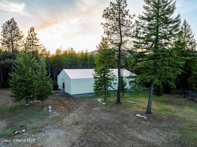 5867 W Sparrowhawk Dr, Rathdrum, ID 83858 - view of home's exterior featuring an outdoor structure and a pole building