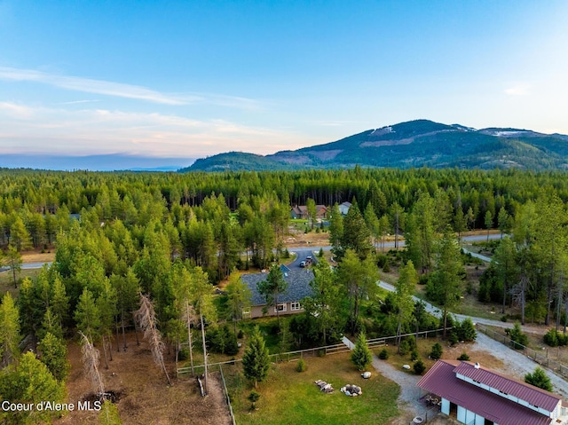5867 W Sparrowhawk Dr, Rathdrum, ID 83858 - bird's eye view with a wooded view and a mountain view