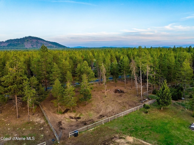 5867 W Sparrowhawk Dr, Rathdrum, ID 83858 - aerial view featuring a forest view and a mountain view