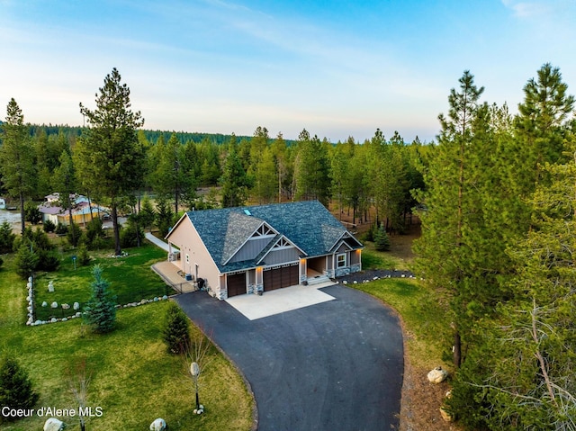 5867 W Sparrowhawk Dr, Rathdrum, ID 83858 - birds eye view of property featuring a forest view