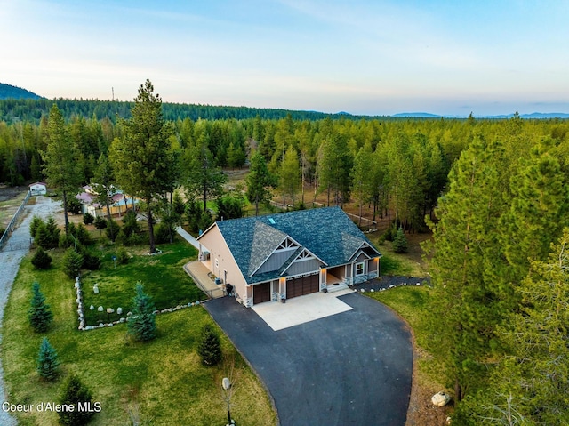 5867 W Sparrowhawk Dr, Rathdrum, ID 83858 - birds eye view of property with a forest view