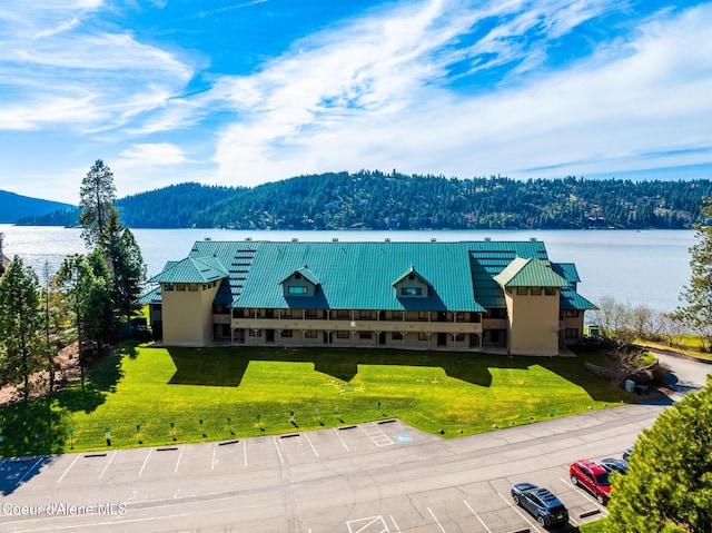 4549 S Arrow Point Dr # 207, Harrison, ID 83833 - exterior space with a forest view and a water view