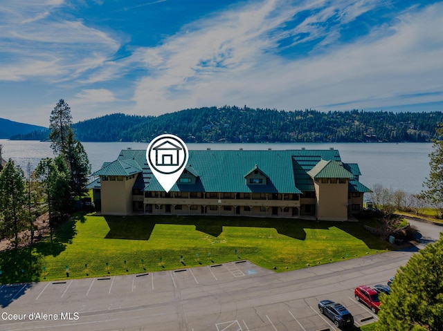 4549 S Arrow Point Dr # 207, Harrison, ID 83833 - exterior space featuring a wooded view and a mountain view