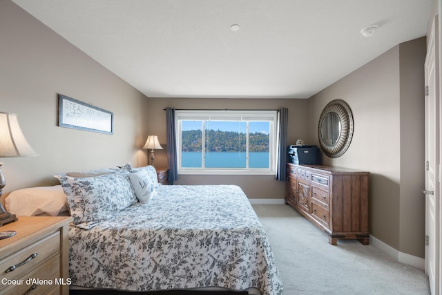 4549 S Arrow Point Dr # 207, Harrison, ID 83833 - bedroom with light carpet and baseboards