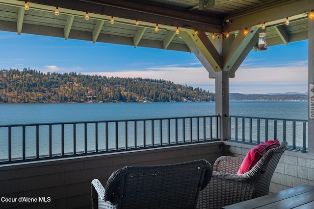 4549 S Arrow Point Dr # 207, Harrison, ID 83833 - balcony featuring a water view