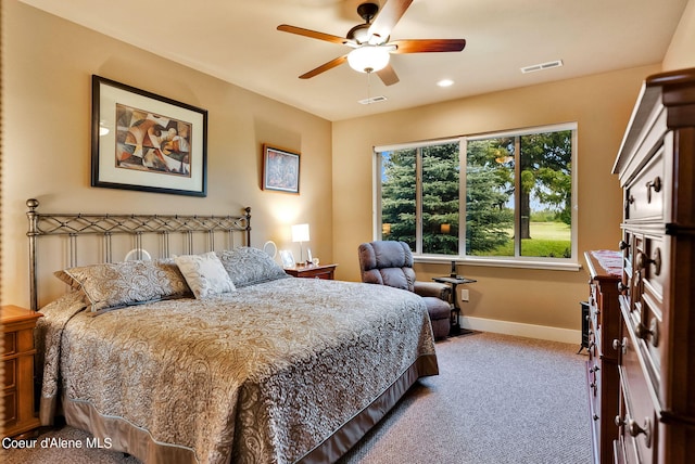 carpeted bedroom featuring baseboards, a ceiling fan, visible vents, and recessed lighting