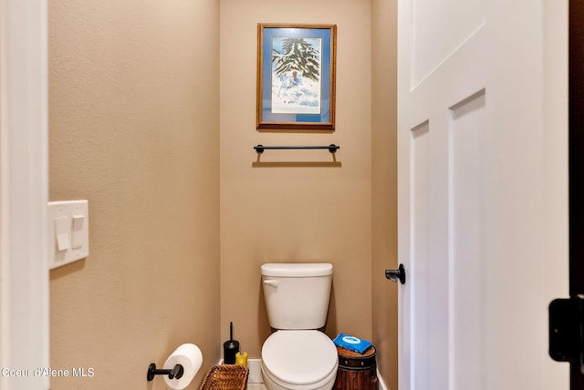 bathroom featuring toilet