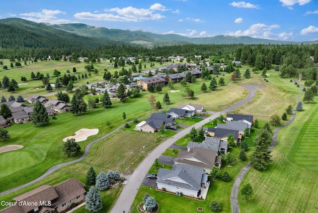 bird's eye view with a residential view, a view of trees, and a mountain view