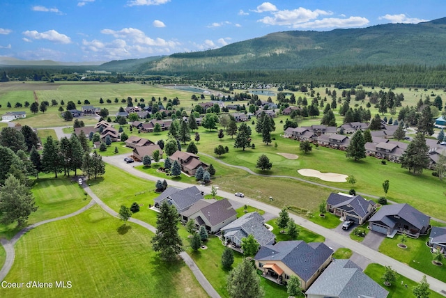 drone / aerial view with a residential view and a mountain view