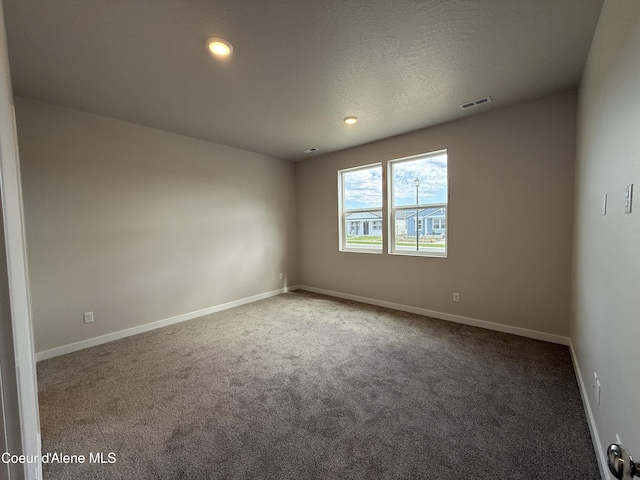 5147 E Norma Ave, Post Falls, ID 83854 - carpeted empty room featuring baseboards and recessed lighting