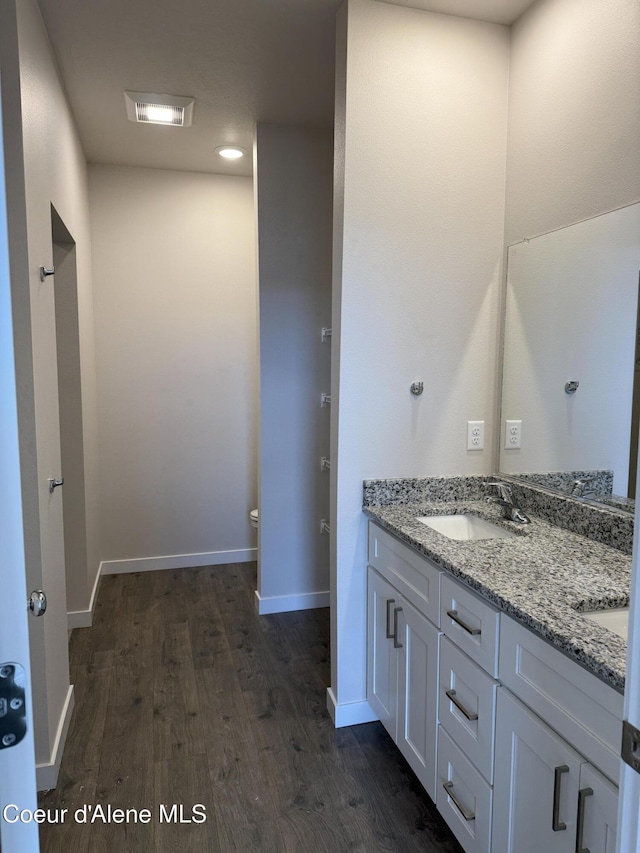 5147 E Norma Ave, Post Falls, ID 83854 - full bath featuring wood finished floors and double vanity