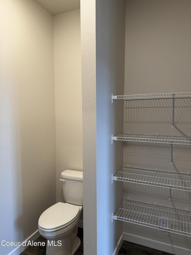5147 E Norma Ave, Post Falls, ID 83854 - bathroom with baseboards and toilet