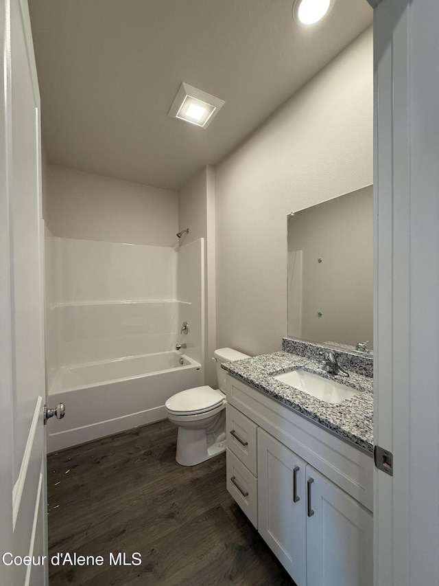 5147 E Norma Ave, Post Falls, ID 83854 - full bath with vanity, wood finished floors, and bathtub / shower combination