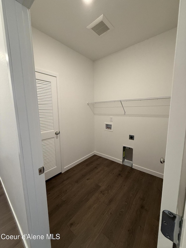 5119 E Rigel Ln, Post Falls, ID 83854 - laundry area featuring dark wood-style flooring, washer hookup, and electric dryer hookup