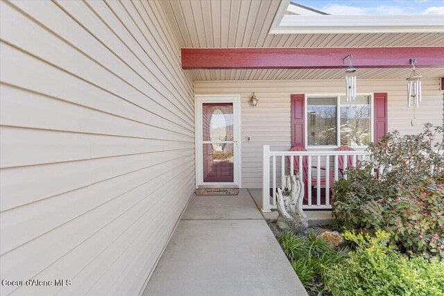 8514 W Grand Teton St, Rathdrum, ID 83858 - property entrance featuring covered porch