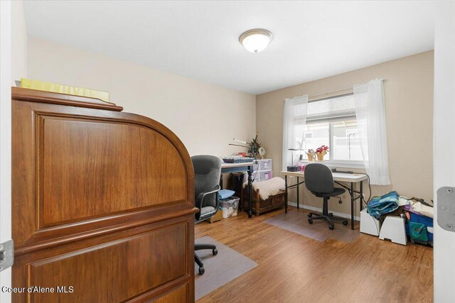 8514 W Grand Teton St, Rathdrum, ID 83858 - home office with wood finished floors