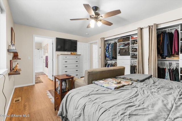 8514 W Grand Teton St, Rathdrum, ID 83858 - bedroom with ceiling fan, baseboards, light wood-style floors, and visible vents