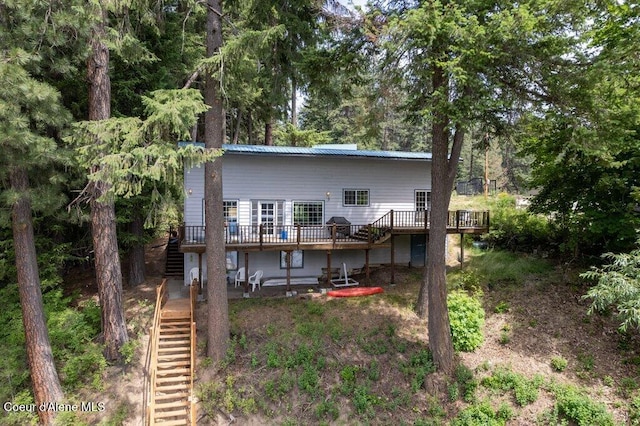 14314 N Waters Edge Ct, Hayden, ID 83835 - rear view of property featuring stairs and a deck