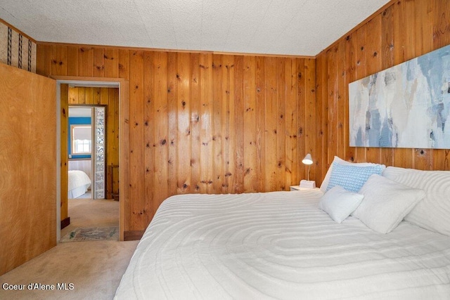 14314 N Waters Edge Ct, Hayden, ID 83835 - bedroom with wooden walls and carpet