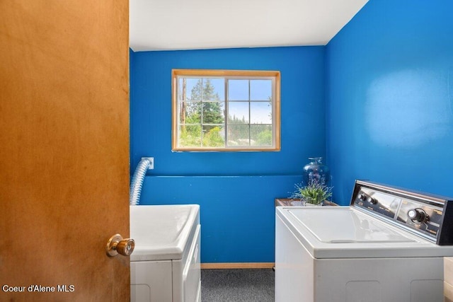 14314 N Waters Edge Ct, Hayden, ID 83835 - washroom with washer and clothes dryer and carpet floors