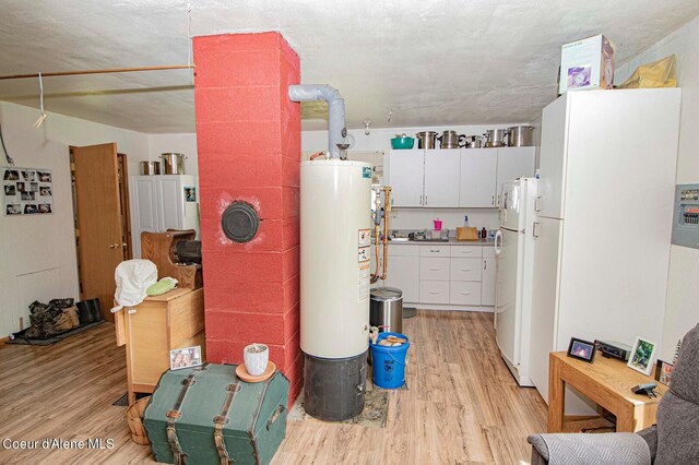 2884 Morris Rd, Naples, ID 83847 - utility room featuring gas water heater