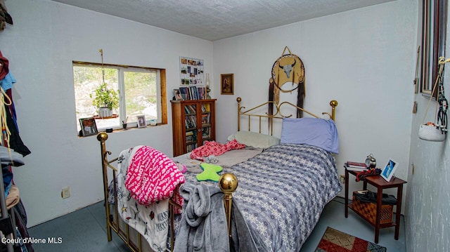2884 Morris Rd, Naples, ID 83847 - bedroom featuring concrete floors