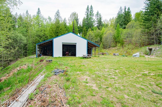 2884 Morris Rd, Naples, ID 83847 - view of pole building featuring a view of trees and a lawn