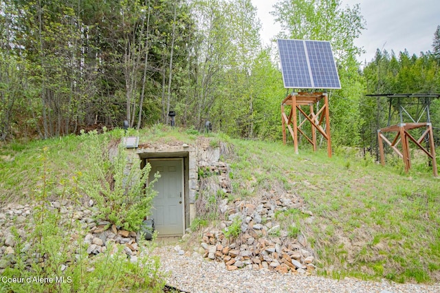2884 Morris Rd, Naples, ID 83847 - entry to storm shelter with a wooded view